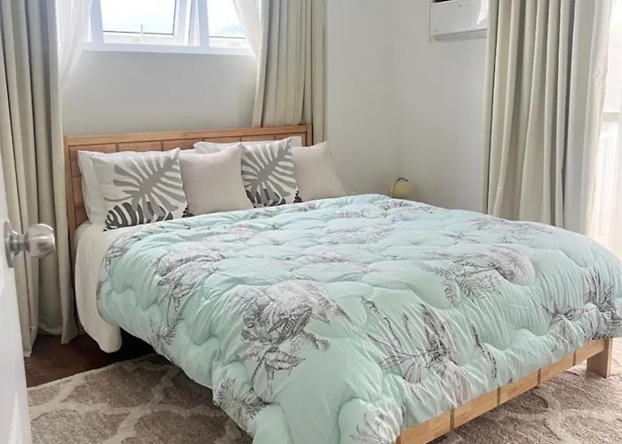 アパートホテル Amani Grand Residences マクタン