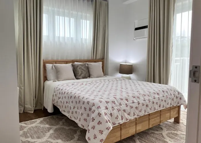 アパートホテル Amani Grand Residences マクタン